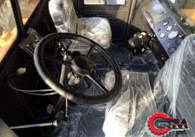 Дорожная машина ДМ 15 кабина